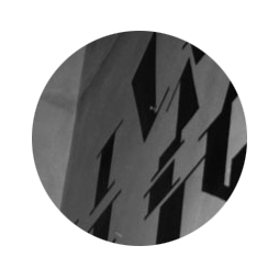 design on concrete wall by Adèle Houssin